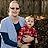 A woman is holding a child in her arms and posing for a picture.